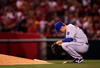 ANAHEIM, CA - MAY 9:  Pitcher Zack Greinke #23 of the Kansas City Royals kneels behind the mound before pitching the eighth inning against the Los Angeles Angels of Anaheim on May 9, 2009 at Angel Stadium in Anaheim, California. The Angels won 1-0.  (Photo by Stephen Dunn/Getty Images)