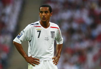 LONDON - OCTOBER 11:  Theo Walcott of England looks on during the 2010 World Cup qualifying match between England and Kazakhstan at Wembley Stadium on October 11, 2008 in London, England.  (Photo by Clive Rose/Getty Images)