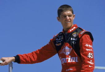 LOUDON, NH - MAY 12:  Adam Petty has a quiet moment alone during practice for what ends up being his last race during the Busch 200, part of the NASCAR Busch Series Grand National Division at the New Hampshire International Speedway in Loudon, New Hampshire on May 12, 2000.  (Photo by M. David Leeds /Getty Images)        
