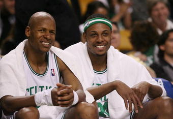 BOSTON - MAY 06:  Ray Allen #20 and Paul Pierce #34 of the Boston Celtics celebrate a win over the Orlando Magic in Game Two of the Eastern Conference Semifinals during the 2009 NBA Playoffs at TD Banknorth Garden on May 6, 2009 in Boston, Massachusetts. The Boston Celtics defeated the Orlando Magic 112-94. NOTE TO USER: User expressly acknowledges and agrees that, by downloading and or using this photograph, User is consenting to the terms and conditions of the Getty Images License Agreement.  (Photo by Elsa/Getty Images)