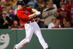 BOSTON - APRIL 24: Jason Bay #44 of the Boston Red Sox hits a two-run home run in the ninth inning to tie the game against the New York Yankees at Fenway Park, April 24, 2009, in Boston, Massachusetts. (Photo by Jim Rogash/Getty Images)