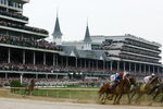 LOUISVILLE, KY - MAY 02:  Jockey Calvin Borel, atop Mine That Bird, rounds turn one in last place during the 135th running of the Kentucky Derby on May 2, 2009 at Churchill Downs in Louisville, Kentucky.  (Photo by Jamie Squire/Getty Images)