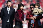 SAN FRANCISCO - NOVEMBER 19:  (L-R) Jed York, Denise DeBartolo York and Eddie DeBartolo look on during a ceremony held in Jerry Rice's honor during half time of the NFL game between the San Francisco 49ers and the Seattle Seahawks at Monster Park on November 19, 2006 in San Francisco, California.  (Photo by Jed Jacobsohn/Getty Images)