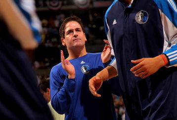 DENVER - MAY 05:  Mark Cuban, owner of the Dallas Mavericks, welcomes his team to the court during player introductions prior to facing the Denver Nuggets in Game Two of the Western Conference Semifinals during the 2009 NBA Playoffs at Pepsi Center on May 5, 2009 in Denver, Colorado. NOTE TO USER: User expressly acknowledges and agrees that, by downloading and or using this photograph, User is consenting to the terms and conditions of the Getty Images License Agreement.  (Photo by Doug Pensinger/Getty Images)