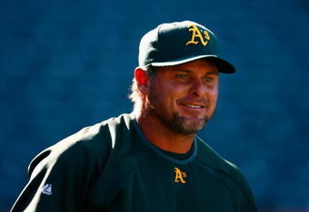 ANAHEIM, CA - APRIL 06:  Jason Giambi #16 of the Oakland Athletics warms up during batting practice prior to the start of the opening day game against the Los Angeles Angels of Anaheim at Angel Stadium on April 6, 2009 in Anaheim, California. The Angels defeated the Athletics 3-0.  (Photo by Jeff Gross/Getty Images)