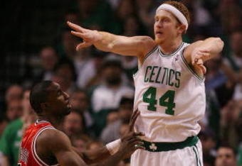 BOSTON - MAY 02:  Brian Scalabrine #44 of the Boston Celtics passes the ball as Ben Gordon #7 of the Chicago Bulls defends in Game Seven of the Eastern Conference Quarterfinals during the 2009 NBA Playoffs at TD Banknorth Garden on May 2, 2009 in Boston, Massachusetts. The Celtics defeated the Bulls 109-99. NOTE TO USER: User expressly acknowledges and agrees that, by downloading and or using this photograph, User is consenting to the terms and conditions of the Getty Images License Agreement.  (Photo by Elsa/Getty Images)