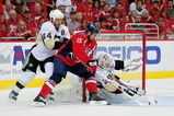 WASHINGTON - MAY 09:  Boyd Gordon #15 of the Washington Capitals tries to stuff a shot on goal between Brooks Orpik #44 and Marc-Andre Fleury #29 of the Pittsburgh Penguins during Game Five of the Eastern Conference Semifinal Round of the 2009 Stanley Cup Playoffs on May 9, 2009 at the Verizon Center in Washington,  DC.  (Photo by Len Redkoles/Getty Images)