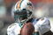 MIAMI, FL - JANUARY 4:  Running back Ricky Williams #34 of the Miami Dolphins grabs a warm up pass before play against the Baltimore Ravens in an NFL Wildcard Playoff Game at Dolphins Stadium on January 4, 2009 in Miami, Florida.  (Photo by Al Messerschmidt/Getty Images) 