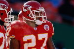 KANSAS CITY, MO - DECEMBER 21:  Larry Johnson #27 of the Kansas City Chiefs looks on during the game against the Miami Dolphins on December 21, 2008 at Arrowhead Stadium in Kansas City, Missouri. (Photo by Jamie Squire/Getty Images)