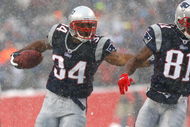 FOXBORO, MA - DECEMBER 21: Randy Moss #81 blocks for teammate Sammy Morris #34 of the New England Patriot against the Arizona Cardinals at Gillette Stadium on December 21, 2008 in Foxboro, Massachusetts. The Patriots won 47-7. (Photo by Jim Rogash/Getty Images)