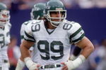 SEPTEMBER - 1988:  Defensive end Mark Gastineau #99 of the New York Jets looks on from the sidelines during a game circa September of 1988.  (Photo by Scott Halleran/Getty Images) 