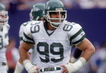 SEPTEMBER - 1988:  Defensive end Mark Gastineau #99 of the New York Jets looks on from the sidelines during a game circa September of 1988.  (Photo by Scott Halleran/Getty Images) 