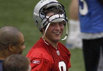 ALLEN PARK, MI - MAY 01:  Matt Stafford #9 of the Detroit Lions talks with teammates during rookie orientation camp at the Detroit Lions Headquarters and Training Facility on May 1, 2009 in Allen Park, Michigan.  (Photo by Gregory Shamus/Getty Images)