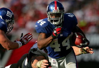 TAMPA, FL - JANUARY 06:  Runningback Ahmad Bradshaw #44 of the New York Giants carries the ball during the NFC Wild Card game against Tampa Bay Buccaneers at Raymond James Stadium on January 6, 2008 in Tampa, Florida.  (Photo by Matthew Stockman/Getty Images)