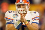 MIAMI - JANUARY 08:  Quarterback Tim Tebow #15 of the Florida Gators reacts on the field against the Oklahoma Sooners during the FedEx BCS National Championship Game at Dolphin Stadium on January 8, 2009 in Miami, Florida.  (Photo by Eliot J. Schechter/Getty Images)