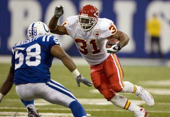 INDIANAPOLIS - NOVEMBER 18:  Priest Holmes #31 of the Kansas City Chiefs rushes against Gary Brackett #58 of the Indianapolis Colts on November 18, 2007 at the RCA Dome in Indianapolis, Indiana. The Colts defeated the Chiefs 13-10.  (Photo by Dilip Vishwanat/Getty Images)
