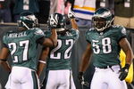 PHILADELPHIA - DECEMBER 15:  Asante Samuel #22 of the Philadelphia Eagles celebrates with Quintin Mikell #27 and Trent Cole #58 after an interception for a touchdown against the Cleveland Browns on December 15, 2008 at Lincoln Financial Field in Philadelphia, Pennsylvania.  (Photo by Jim McIsaac/Getty Images)