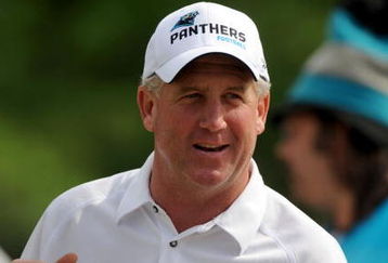 CHARLOTTE,NC- MAY 1: Head Coach John Fox (R) smiles as he talks to some fans after the minicamp practice  at the team's practice facility on May 1, 2009 in Charlotte, North Carolina. (Photo by Steve Dykes/Getty Images)