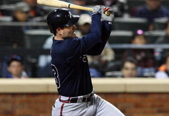 NEW YORK - MAY 11:  Matt Diaz #23 of the Atlanta Braves connects for a two run double in the seventh inning against the New York Mets on May 11, 2009 at Citi Field in the Flushing neighborhood of the Queens borough of New York City.  (Photo by Jim McIsaac/Getty Images)