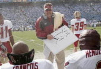 CHAPEL HILL, NC - NOVEMBER 5:  Defensive coordinator Frank Spaziani of the Boston College Eagles talks to players on the sideline against the North Carolina Tar Heels at Kenan Stadium on November 5, 2005 in Chapel Hill, North Carolina. North Carolina won 16-14.  (Photo By Grant Halverson/Getty Images)