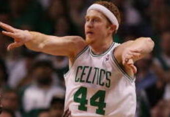 BOSTON - MAY 02:  Brian Scalabrine #44 of the Boston Celtics passes the ball as Ben Gordon #7 of the Chicago Bulls defends in Game Seven of the Eastern Conference Quarterfinals during the 2009 NBA Playoffs at TD Banknorth Garden on May 2, 2009 in Boston, Massachusetts. The Celtics defeated the Bulls 109-99. NOTE TO USER: User expressly acknowledges and agrees that, by downloading and or using this photograph, User is consenting to the terms and conditions of the Getty Images License Agreement.  (Photo by Elsa/Getty Images)