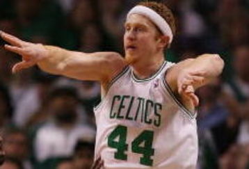 BOSTON - MAY 02:  Brian Scalabrine #44 of the Boston Celtics passes the ball as Ben Gordon #7 of the Chicago Bulls defends in Game Seven of the Eastern Conference Quarterfinals during the 2009 NBA Playoffs at TD Banknorth Garden on May 2, 2009 in Boston, Massachusetts. The Celtics defeated the Bulls 109-99. NOTE TO USER: User expressly acknowledges and agrees that, by downloading and or using this photograph, User is consenting to the terms and conditions of the Getty Images License Agreement.  (Photo by Elsa/Getty Images)
