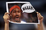 MIAMI - MAY 29:  A Miami Heat fan holds up a sign heckling Rasheed Wallace #36 of the Detroit Pistons in game four of the Eastern Conference Finals during the 2006 NBA Playoffs on May 29, 2006 at American Airlines Arena in Miami, Florida. NOTE TO USER: User expressly acknowledges and agrees that, by downloading and or using this photograph, User is consenting to the terms and conditions of the Getty Images License Agreement.  (Photo by Doug Benc/Getty Images)