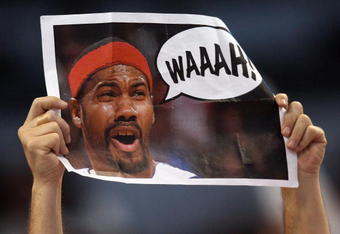 MIAMI - MAY 29:  A Miami Heat fan holds up a sign heckling Rasheed Wallace #36 of the Detroit Pistons in game four of the Eastern Conference Finals during the 2006 NBA Playoffs on May 29, 2006 at American Airlines Arena in Miami, Florida. NOTE TO USER: User expressly acknowledges and agrees that, by downloading and or using this photograph, User is consenting to the terms and conditions of the Getty Images License Agreement.  (Photo by Doug Benc/Getty Images)