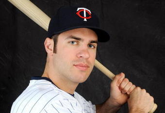 FORT MYERS, FL - FEBRUARY 23: Joe Mauer #7 of the Minnesota Twins poses during photo day at the Twins spring training complex on February 23, 2008 in Fort Myers, Florida. (Photo by Rob Tringali/Getty Images)