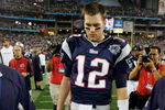 GLENDALE, AZ - FEBRUARY 03:  Quarterback Tom Brady #12 of the New England Patriots walks off the field after losing to the New York Giants 17-14 during Super Bowl XLII on February 3, 2008 at the University of Phoenix Stadium in Glendale, Arizona.  (Photo by Streeter Lecka/Getty Images)