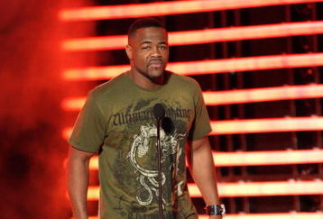 CULVER CITY, CA - DECEMBER 14:  UFC fighter Rashad Evans presents the Best Shooter award onstage at Spike TV's 2008 'Video Game Awards' held at Sony Pictures' Studios on December 14, 2008 in Culver City, California.  (Photo by Kevin Winter/Getty Images for Spike TV)
