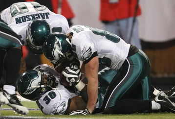 MINNEAPOLIS - JANUARY 04:  Brian Westbrook #36  of the Philadelphia Eagles celebrates his touchdown with teammates DeSean Jackson #10 and Kevin Curtis #80 in the fourth quarter against the Minnesota Vikings during the NFC Wild Card playoff game on January 4, 2009 at the Hubert H. Humphrey Metrodome in Minneapolis, Minnesota. The Eagles defeated the Vikings 26-14.(Photo by Elsa/Getty Images)