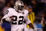 SAN DIEGO - DECEMBER 04:  Justin Miller #22 of the Oakland Raiders returns the ball during a kick off against the San Diego Chargers on December 4, 2008 at Qualcomm Stadium in San Diego, California.  (Photo by Harry How/Getty Images)
