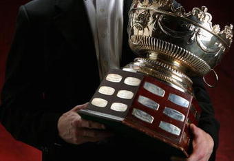VANCOUVER, BC - JUNE 22:  Rod Brind'Amour of the Carolina Hurricanes poses with the Selke Trophy backstage at the the NHL TV Awards Show at the Westin Grand on June 22, 2006 in Vancouver, Canada.  (Photo by Harry How/Getty Images for NHL)