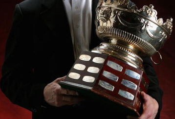 VANCOUVER, BC - JUNE 22:  Rod Brind'Amour of the Carolina Hurricanes poses with the Selke Trophy backstage at the the NHL TV Awards Show at the Westin Grand on June 22, 2006 in Vancouver, Canada.  (Photo by Harry How/Getty Images for NHL)