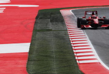 BARCELONA, SPAIN - MAY 09:  Kimi Raikkonen of Finland and Ferrari drives during qualifying for the Spanish Formula One Grand Prix at the Circuit de Catalunya on May 9, 2009 in Barcelona, Spain.  (Photo by Clive Mason/Getty Images)