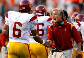 CHARLOTTESVILLE, VA - AUGUST 30:  Head coach Pete Carroll (R) congratulates uarterback Mark Sanchez #6 of the Southern California Trojans after another touchdown in their 52-7 win over the Virginia Cavaliers during the game at Scott Stadium on August 30, 2008 in Charlottesville, Virginia.  (Photo by Kevin C. Cox/Getty Images)