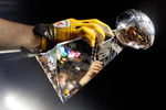 TAMPA, FL - FEBRUARY 01:  Players from the Pittsburgh Steelers celebrate with the Vince Lombardi trophy after their 27-23 win against the Arizona Cardinals during Super Bowl XLIII on February 1, 2009 at Raymond James Stadium in Tampa, Florida.  (Photo by Jamie Squire/Getty Images)