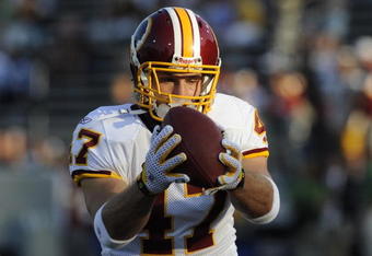 CANTON, OH - AUGUST 3: Tight end Chris Cooley #47 of the Washington Redskins grabs a pass against the Indianapolis Colts in the Pro Football Hall of Fame Game at Fawcett Stadium on August 3, 2008 in Canton, Ohio.   (Photo by Al Messerschmidt/Getty Images) 
