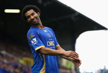 PORTSMOUTH, UNITED KINGDOM - APRIL 11:  Jermaine Pennant of Portsmouth smiles during the Barclays Premier League match between Portsmouth and West Bromwich Albion at Fratton Park on April 11, 2009 in Portsmouth, England.  (Photo by Ryan Pierse/Getty Images)