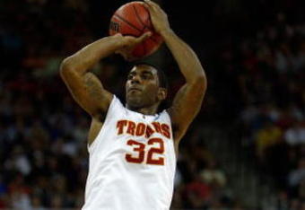OMAHA, NE - MARCH 20:  O.J. Mayo #32 of the USC Trojans attempts a shot against the Kansas State Wildcats during the Midwest Region first round of the 2008 NCAA Men's Basketball Tournament on March 20, 2008 at the Qwest Center in Omaha, Nebraska.  Kansas State won 80-67. (Photo by Jamie Squire/Getty Images)