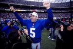 14 Jan 2001:  Quarterback Kerry Collins of the New York Giants celebrates winning the NFC Championship game 41-0 over the Minnesota Vikings at Giants Stadium, East Rutherford, New Jersey.  Mandatory Credit: Doug Pensinger/ALLSPORT