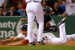 BOSTON - APRIL 26: Jacoby Ellsbury #46 of the Boston Red Sox steals home under the tag by Jorge Posada #20 of the New York Yankees at Fenway Park April 26, 2009 in Boston, Massachusetts. Jacoby Ellsbury recorded the first steal of home by a Red Sox player in 10 years. (Photo by Jim Rogash/Getty Images)