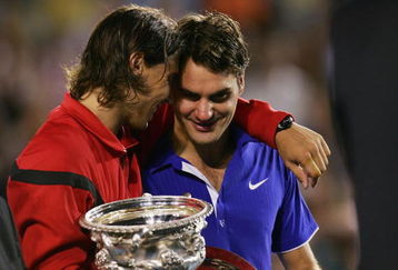 MELBOURNE, AUSTRALIA - FEBRUARY 01:  Rafael Nadal of Spain consoles Roger Federer of Switzerland during the trophy presentation after his men's final match during day fourteen of the 2009 Australian Open at Melbourne Park on  February 1, 2009 in Melbourne, Australia.  (Photo by Scott Barbour/Getty Images)