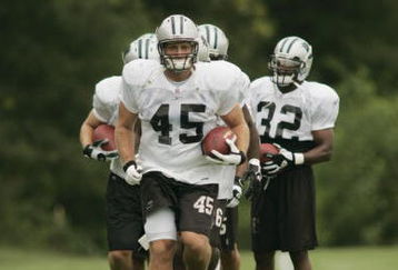 SPARTANBURG, SC - JULY 30:  Brad Hoover #45 of the Carolina Panthers goes through drills during training camp on July 30, 2005, at Wofford College in Spartanburg, South Carolina. (Photo By Grant Halverson/Getty Images) 