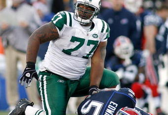 ORCHARD PARK, NY - NOVEMBER 02: Kris Jenkins #77 of the New York Jets gets up after sacking Trent Edwards #5 of the Buffalo Bills  on November 2, 2008 at Ralph Wilson Stadium in Orchard Park, New York. New York won 26-17.  (Photo by Rick Stewart/Getty Images)