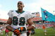 MIAMI - DECEMBER 16:  Defensive end Jason Taylor #99 of the Miami Dolphins celebrates after defeating the Baltimore Ravens at Dolphin Stadium December 16, 2007 in Miami, Florida. The Dolphins defeated the Ravens 22-16 for their first victory of the year.  (Photo by Doug Benc/Getty Images)