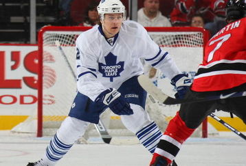 NEWARK, NJ - APRIL 07: Luke Schenn #2 of the Toronto Maple Leafs defends against the New Jersey Devils on April 7, 2009 at the Prudential Center in Newark, New Jersey. The Maple Leafs defeated the Devils 4-1. (Photo by Bruce Bennett/Getty Images)