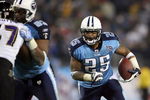 NASHVILLE, TN - JANUARY 10:  Running back LenDale White #25 of the Tennessee Titans runs the ball against the Baltimore Ravens during the AFC Divisional Playoff Game on January 10, 2009 at LP Field in Nashville, Tennessee.  (Photo by Andy Lyons/Getty Images)