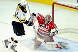 RALEIGH, NC - MAY 12:  Goalkeeper Cam Ward #30 of the Carolina Hurricanes stops a breakaway by Phil Kessel #81 of the Boston Bruins during Game Six of the Eastern Conference Semifinal Round of the 2009 Stanley Cup Playoffs on May 12, 2009 at the RBC Center in Raleigh, North Carolina. The Bruins defeated the Hurricanes 4-2. (Photo by Grant Halverson/Getty Images)